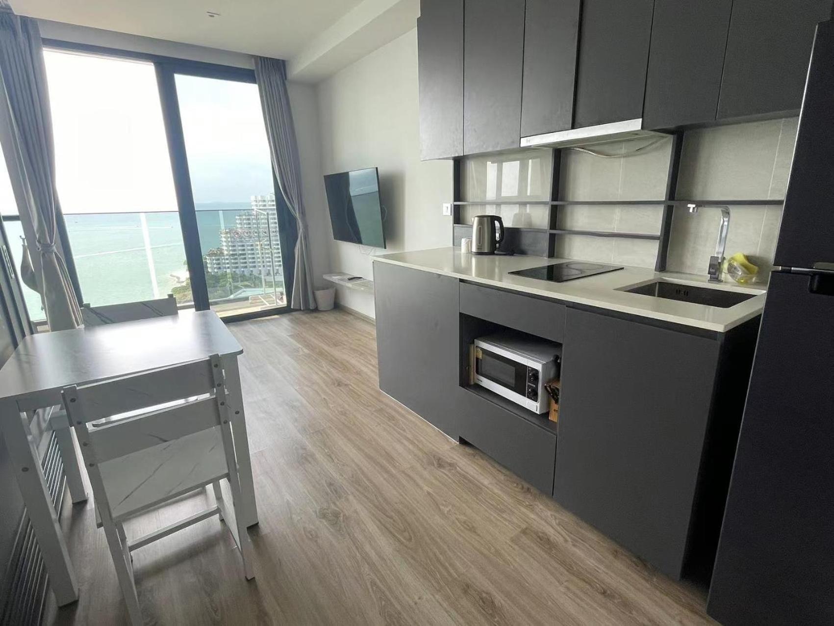 The Andromeda Condominium Seaview Pattaya Kamer foto
