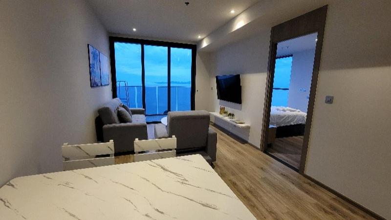 The Andromeda Condominium Seaview Pattaya Kamer foto
